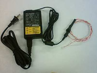 Photo:AC adapter and power cable